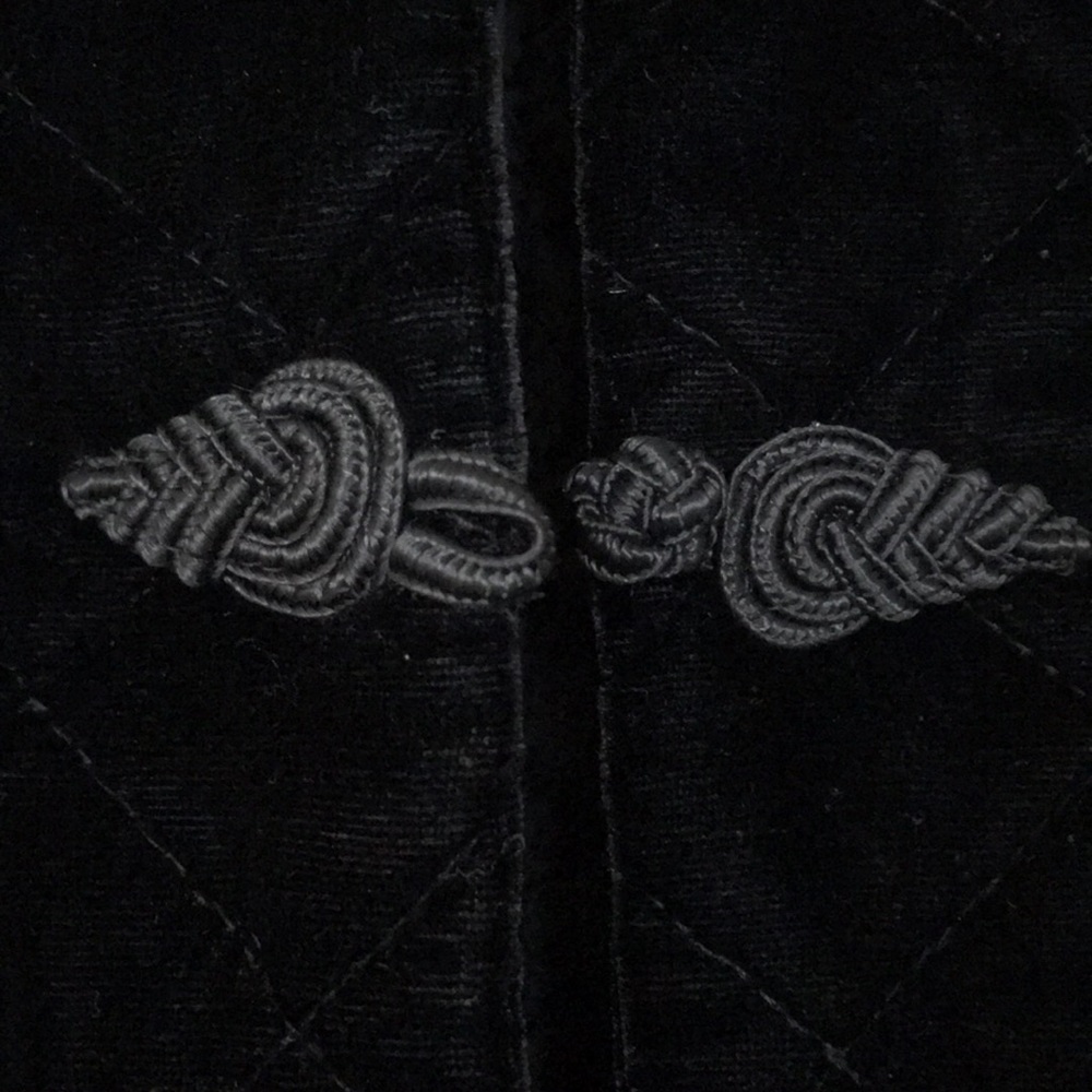 Black velvet jacket.